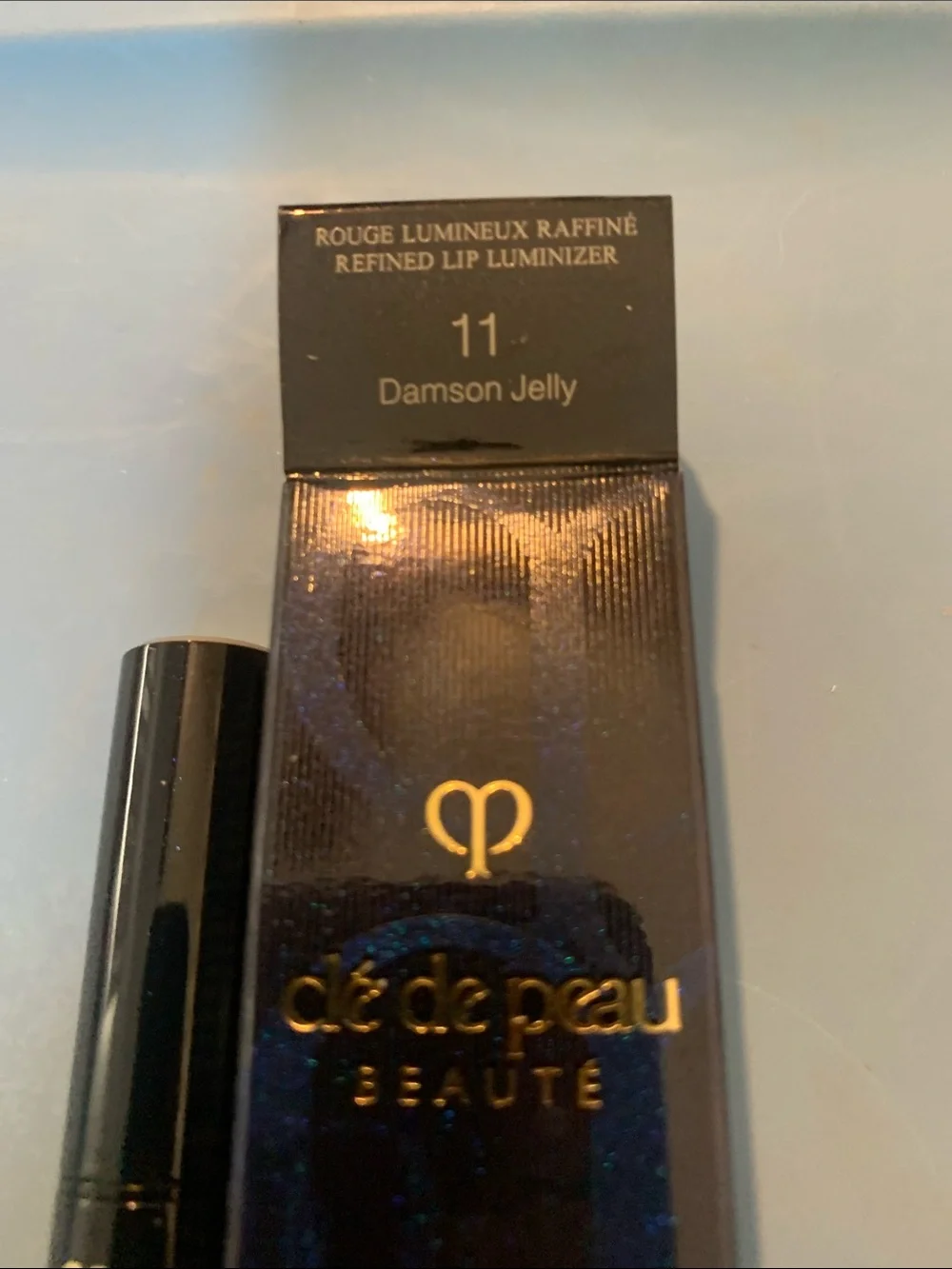 cle de peau Beauté Refined Lip Luminizer 11 Demimon Jelly - glossy red
